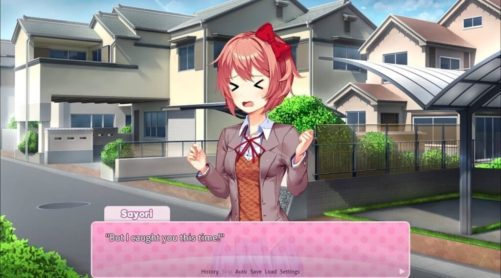 Sayori smiling with a playful >_< expression in Doki Doki Literature Club!, saying “But I caught you this time!” during her early introduction.