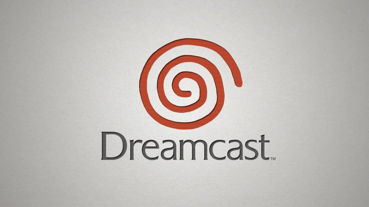The official Sega Dreamcast logo featuring the iconic orange spiral and the "Dreamcast" logotype on a textured grey background.