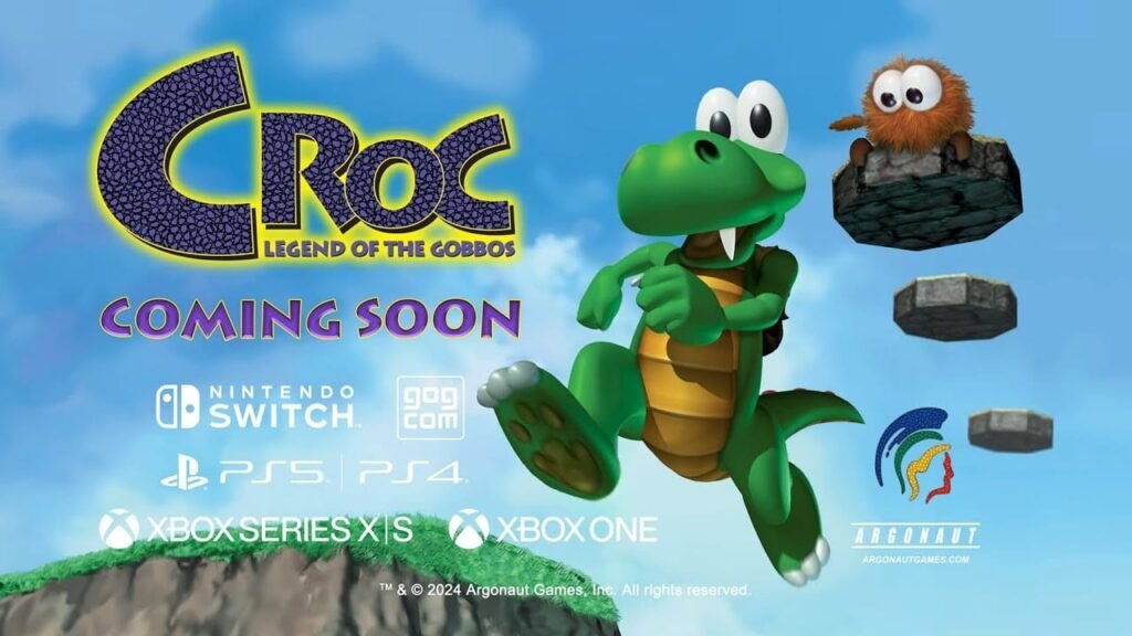 Croc from Croc Legend of the Gobbos remaster jumping in a colorful 3D platforming scene with platform logos and Coming Soon text