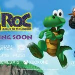 Croc from Croc Legend of the Gobbos remaster jumping in a colorful 3D platforming scene with platform logos and Coming Soon text
