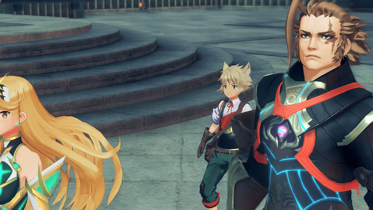 In-game scene showing Mythra with two partner characters poised for battle