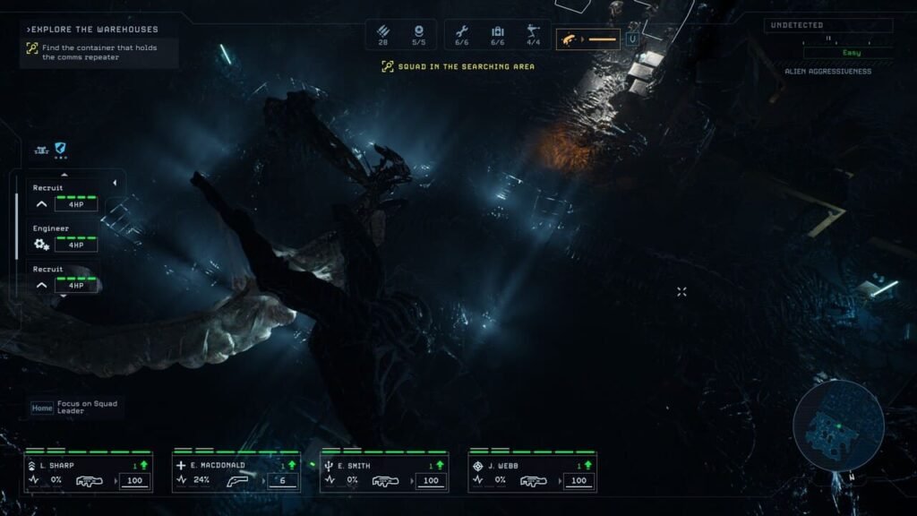 Marine squad exploring a dark industrial corridor with xenomorph corpse in Aliens: Dark Descent