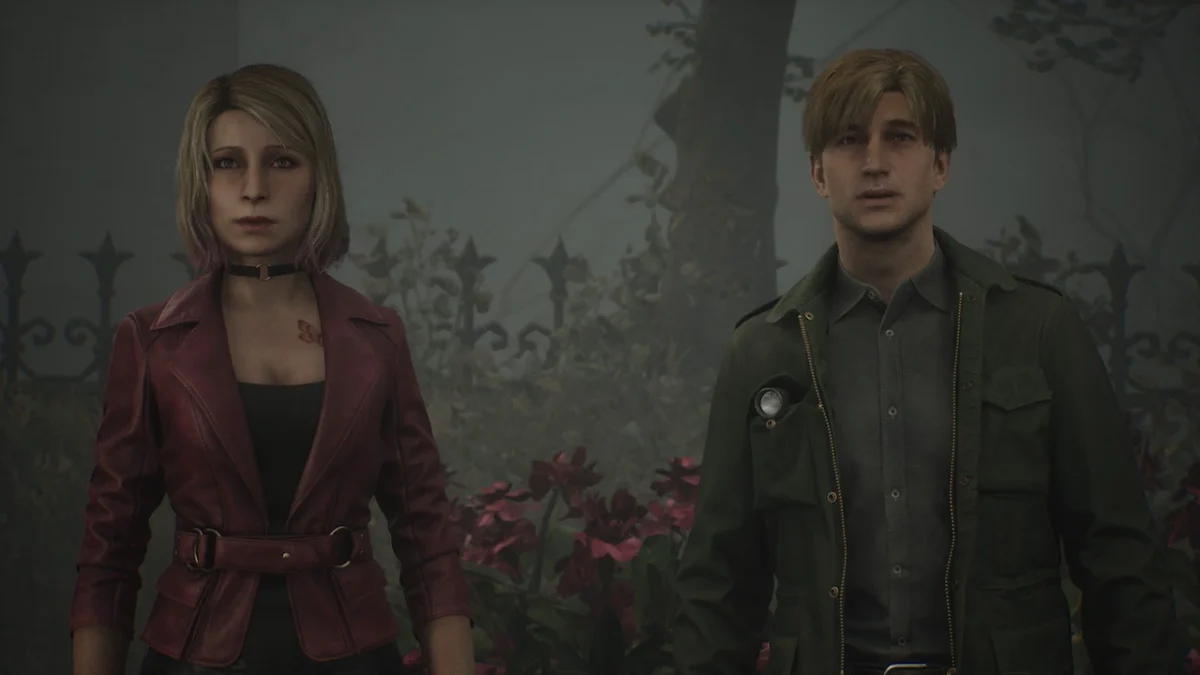 Maria and James in the 2024 Silent Hill 2 remake, standing in a park area and looking toward the viewer; notable differences in character models and clothing compared to the original.