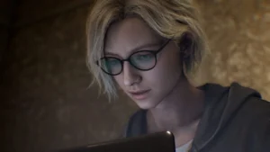 Grace Ashcroft focused on her laptop in Resident Evil Requiem.