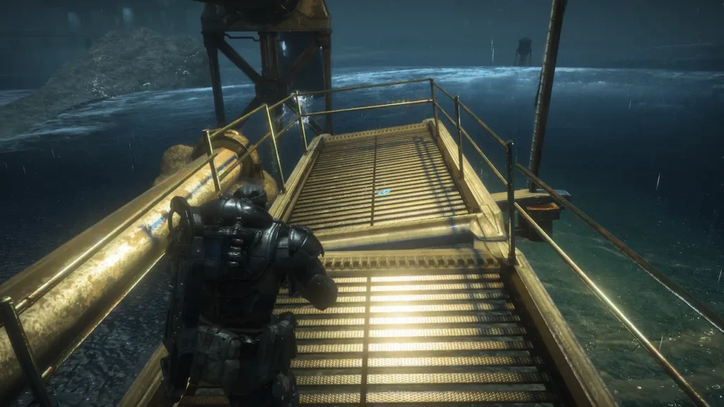 Marcus Fenix approaches a COG tag collectible on a broken bridge in Gears of War: Reloaded.