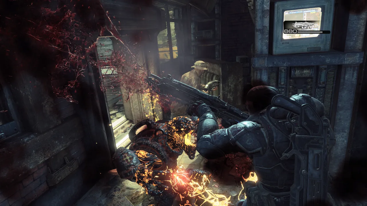 Marcus Fenix uses the Lancer’s chainsaw bayonet on an Imulsion Wretch in Gears of War: Reloaded.