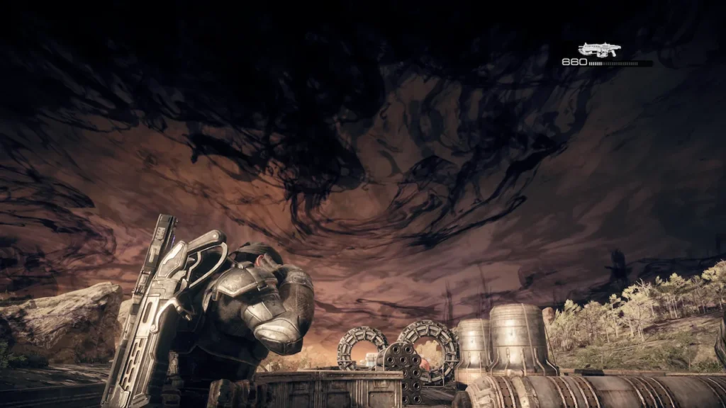 Marcus Fenix looks up at the apocalyptic sky during the train section in Gears of War: Reloaded.