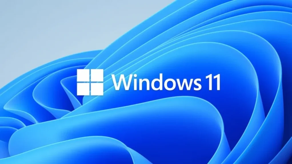 Windows 11 logo over the new signature blue flowing background.