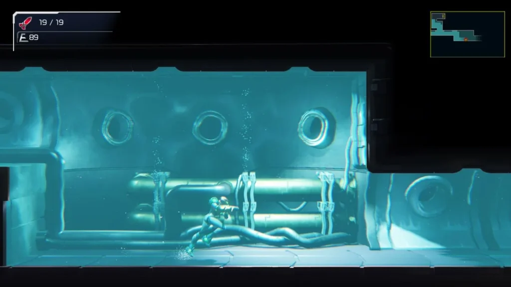 Samus swimming through a flooded industrial tube section of the world in Metroid Dread.