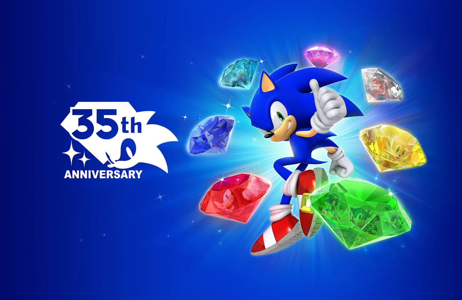 Sonic the Hedgehog 35th anniversary key art featuring Sonic and Chaos Emeralds