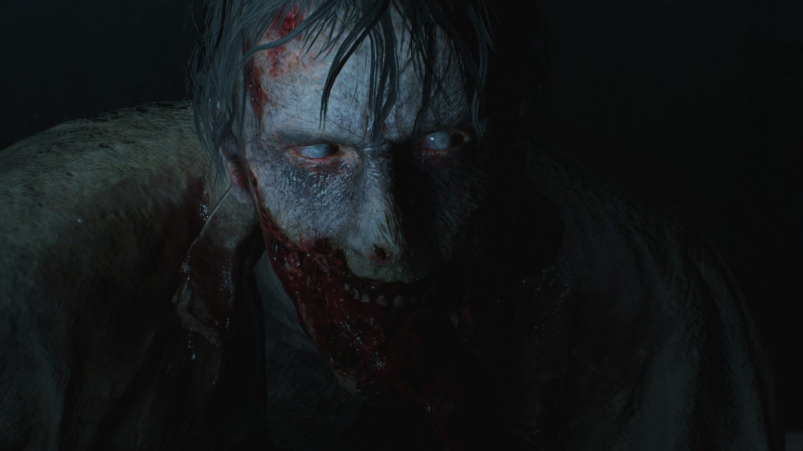 A terrifying close-up of a zombie's face in Resident Evil 2 Reimagining, highlighting the visceral horror of the Raccoon City outbreak.