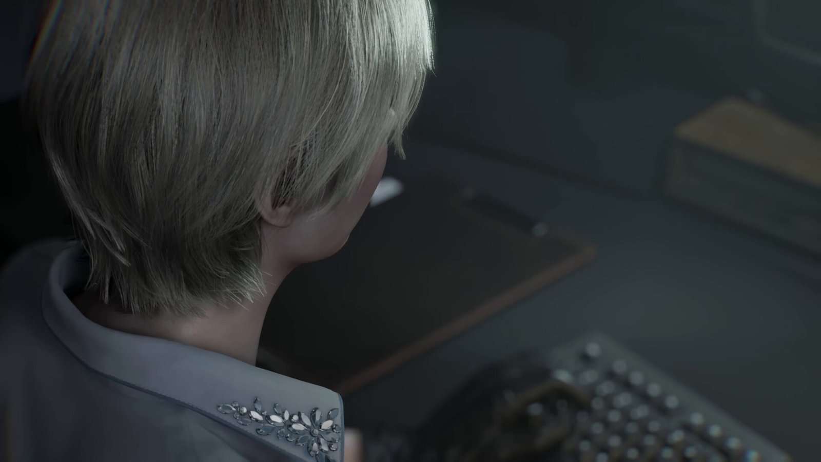 A blonde woman seen from behind working at a computer desk in the Resident Evil Requiem 4th Trailer, possibly Sherry Birkin or Ingrid Hunnigan.