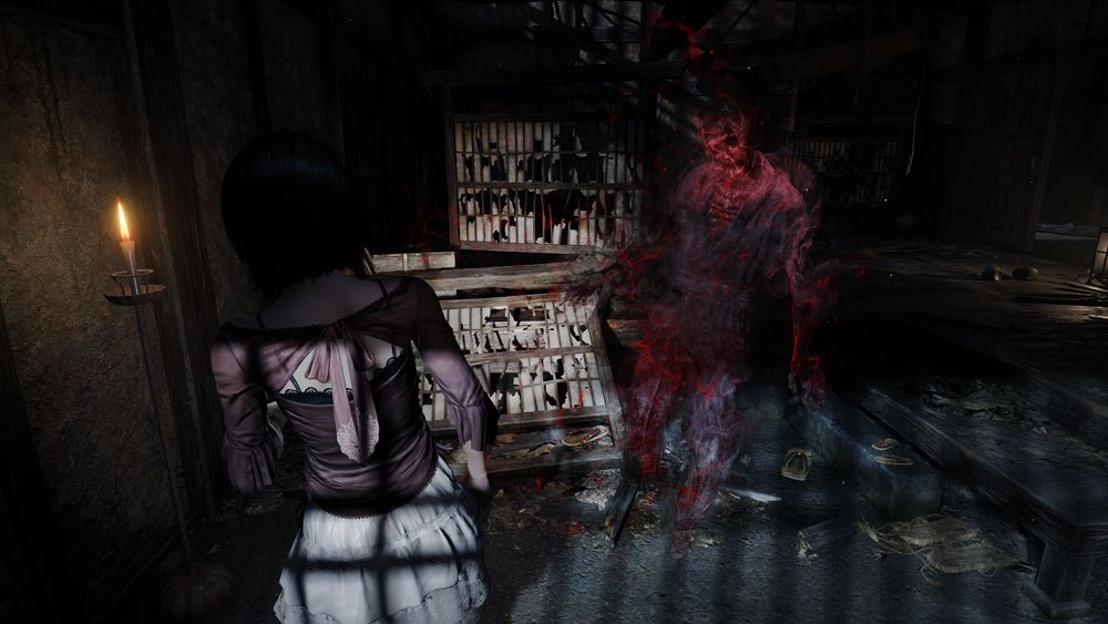 Mio Amakura facing a glowing red spirit in a dark Japanese house from the Fatal Frame 2 Remake ghost balance patch update.