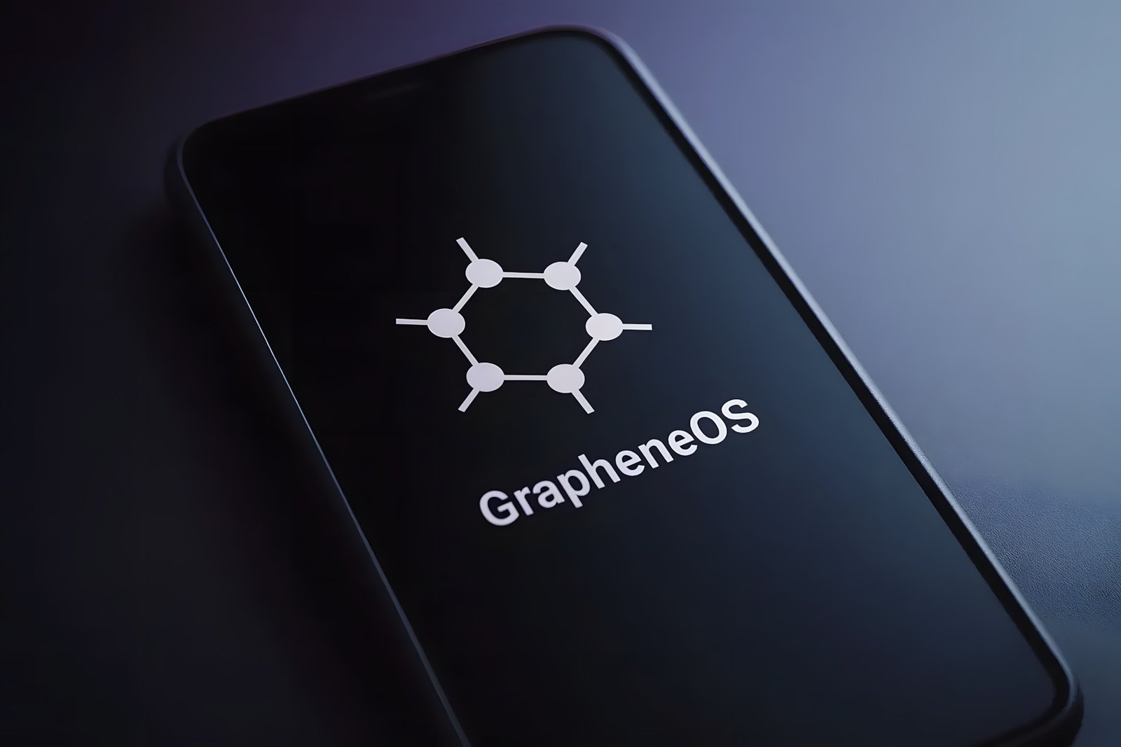 A high-resolution smartphone screen displaying the GrapheneOS logo and name to represent the Motorola GrapheneOS partnership.
