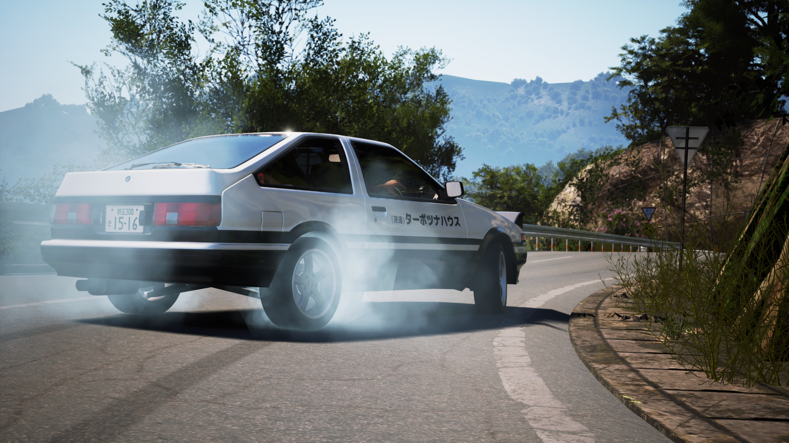 Classic white AE86 hatchback counter-steering and smoking its rear tires on a mountain road for the JDM: Japanese Drift Master physical release.