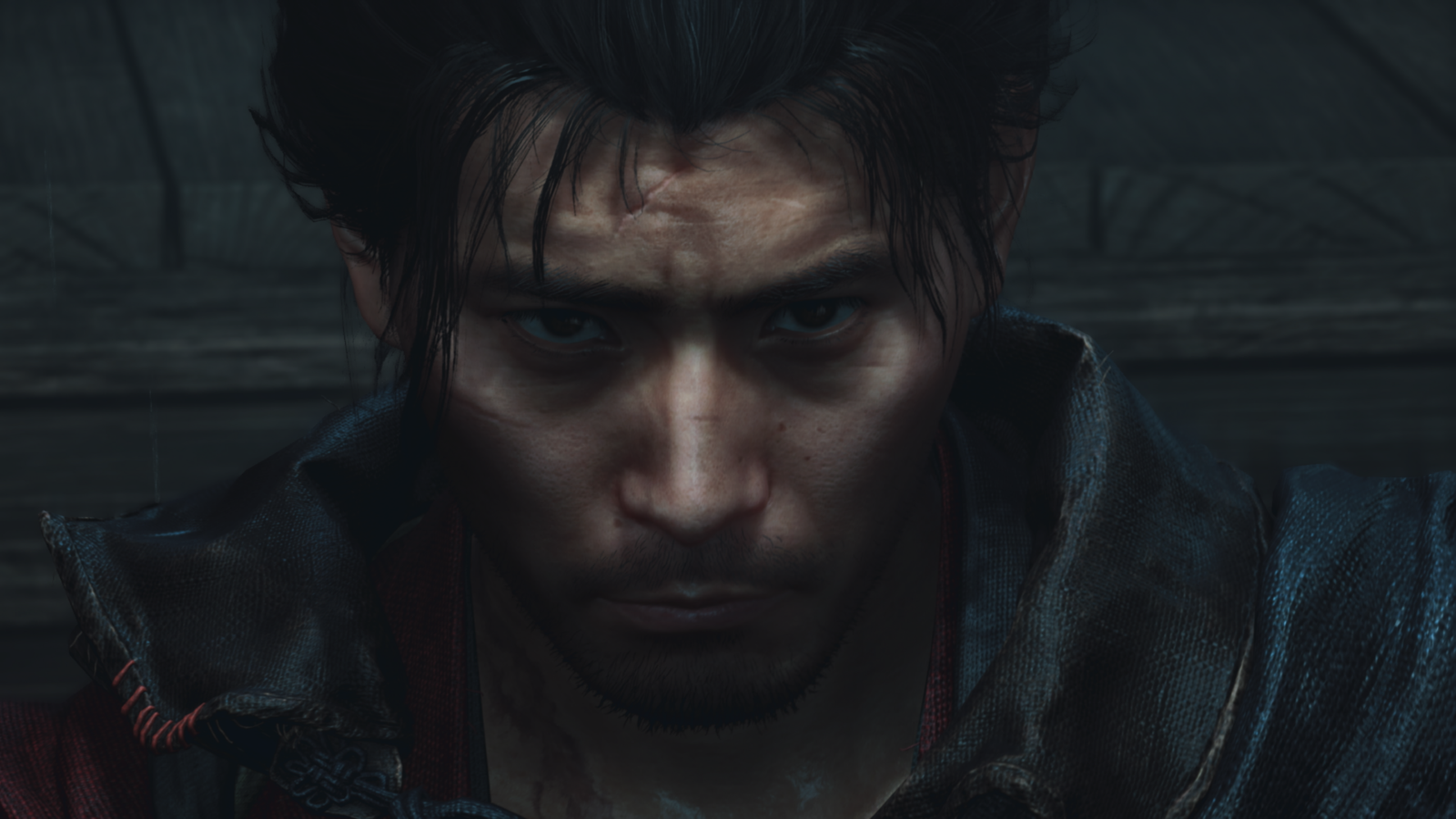 Close-up front-facing portrait of protagonist Miyamoto Musashi showing detailed facial features and hair modeled after actor Toshiro Mifune.