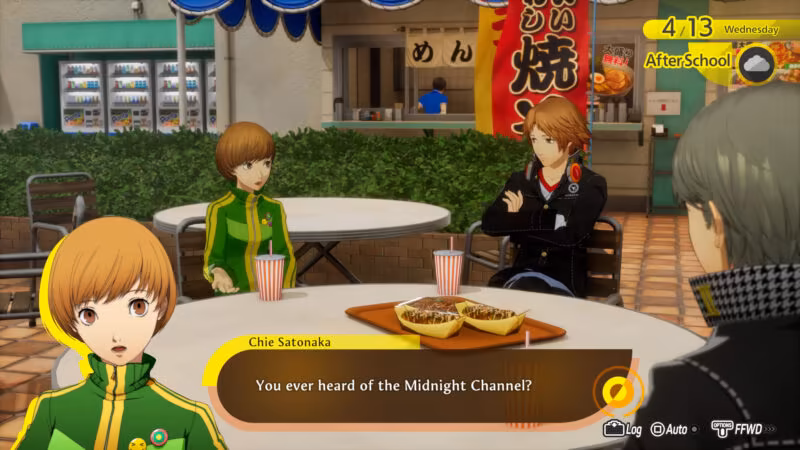 Chie Satonaka talking about the Midnight Channel rumor with Yosuke Hanamura and the protagonist at an outdoor food court.