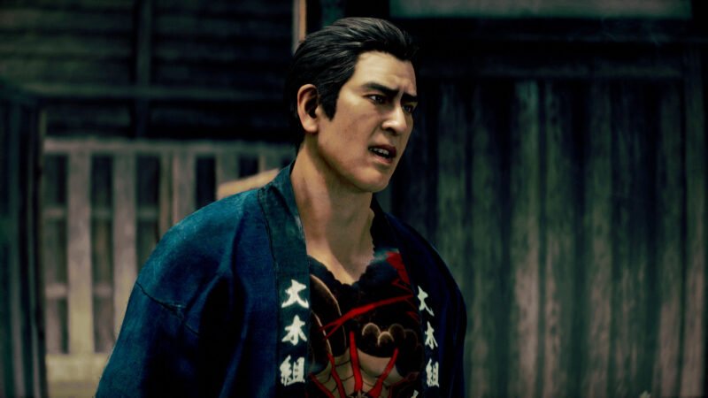 In-game screenshot of Tadashi Hataoka looking tense in Stranger Than Heaven.
